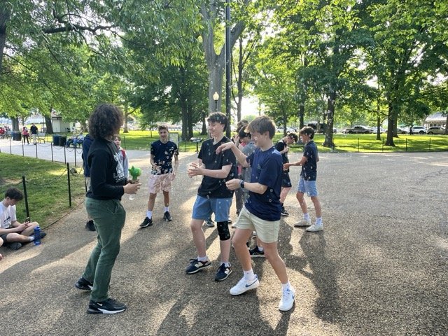 Landmark 8th graders play with bubbles on the Mall